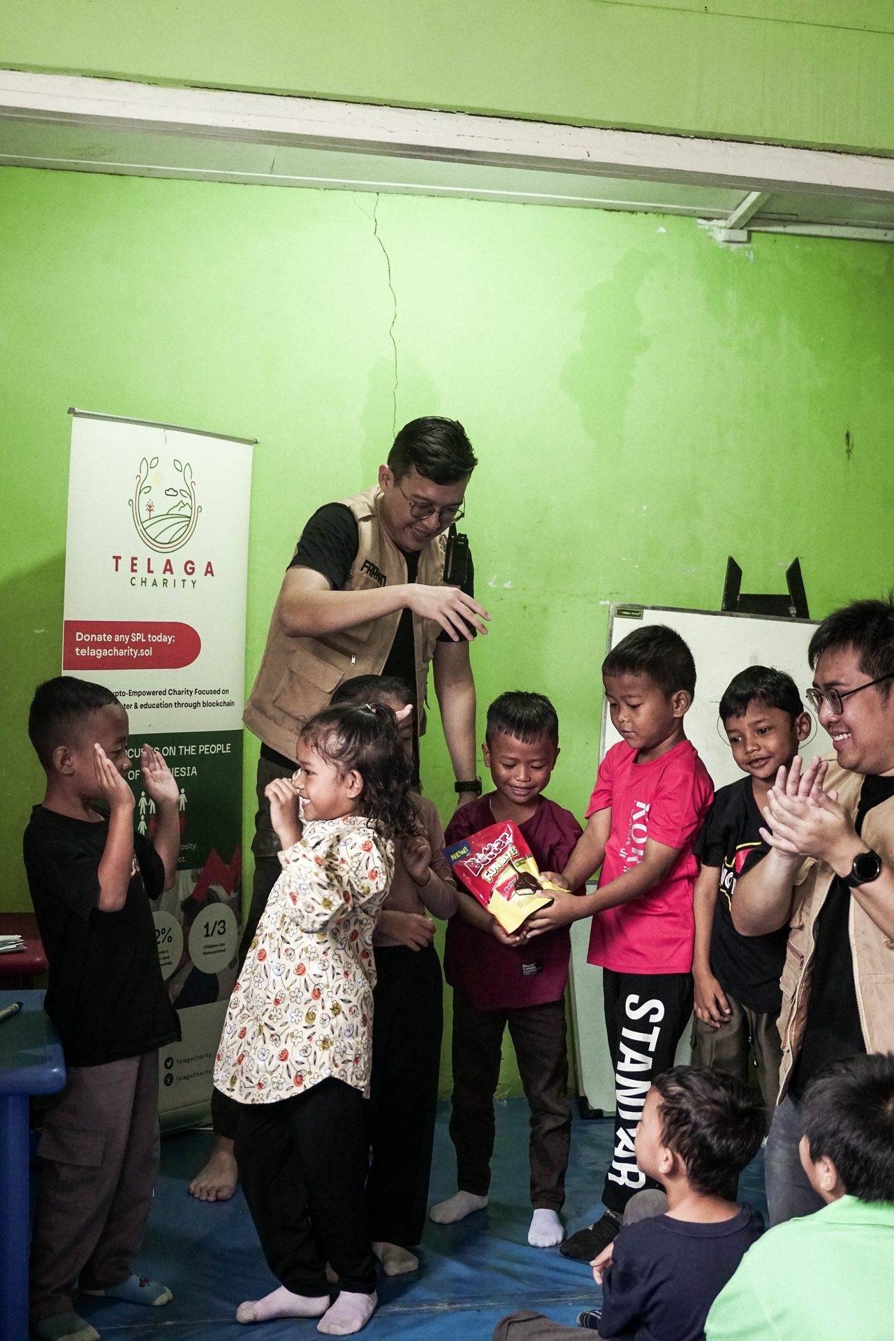 Volunteers handing out food in Indonesia